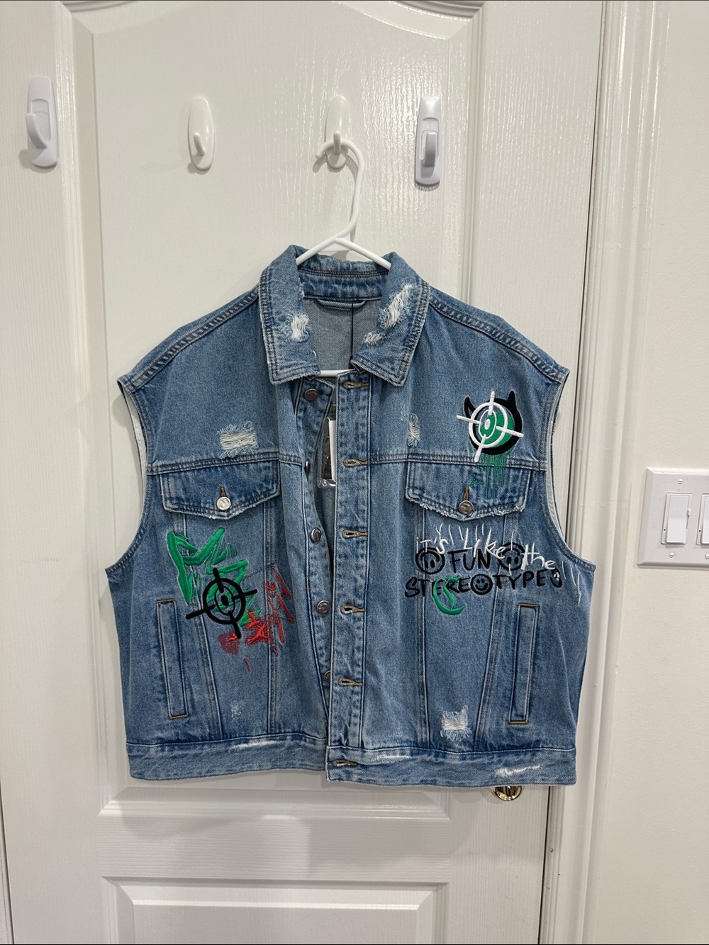 Men's Blue Denim Sleeveless Jacket with Graphic Detail
